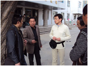 海南地区チベット自治州にある国立病院の院長から情報収集